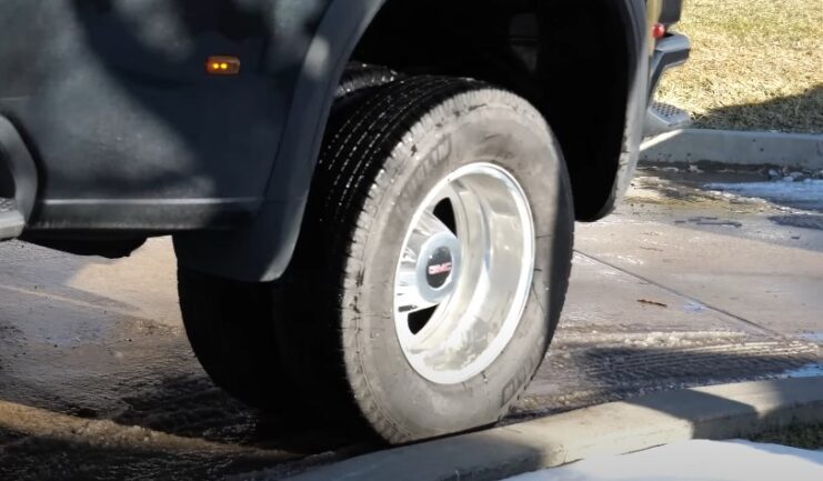 Close-up of a dual rear wheel on a GMC truck